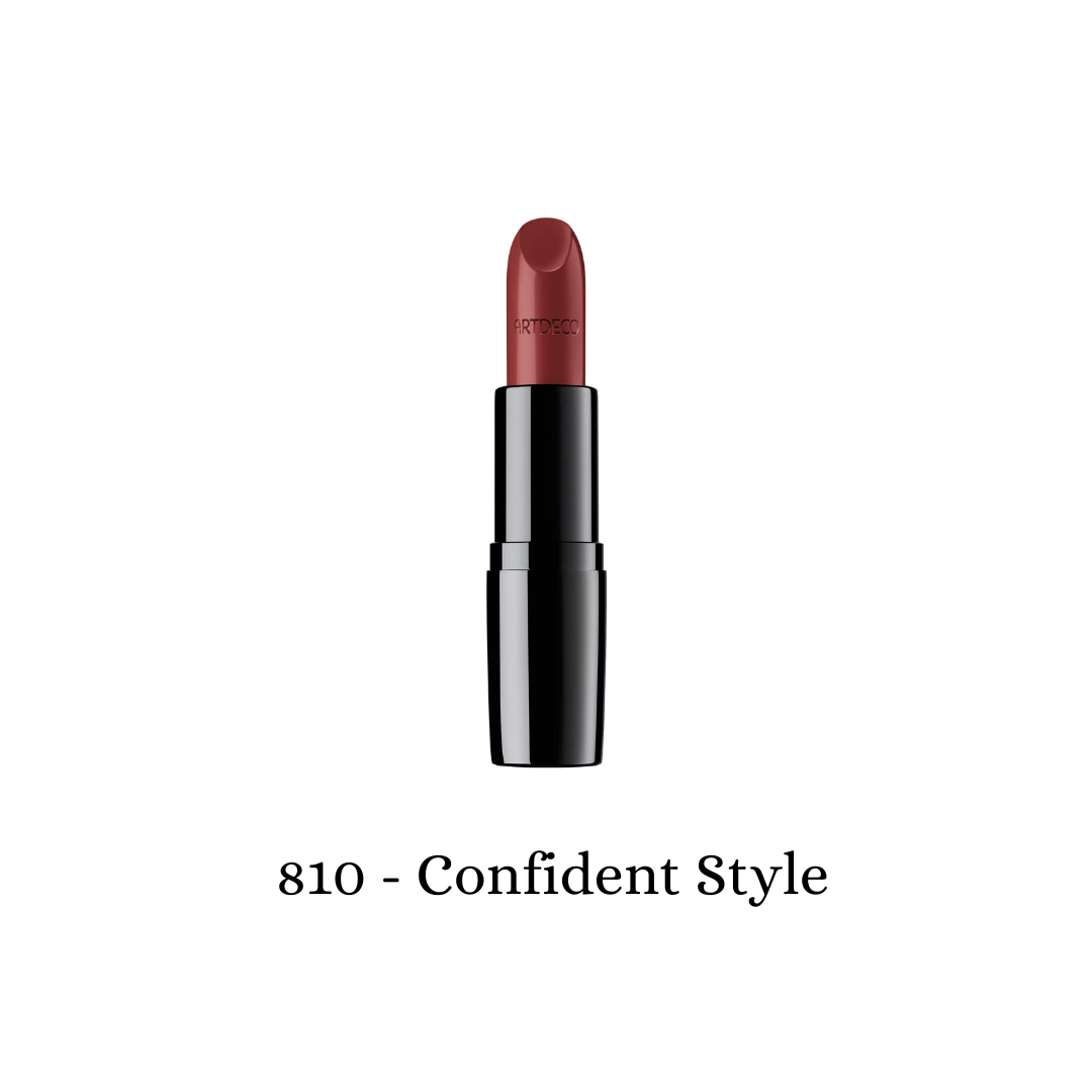 ARTDECO Perfect Color Lipstick in a vibrant shade, showcasing a sleek lipstick tube and the color swatched on a model's lips.