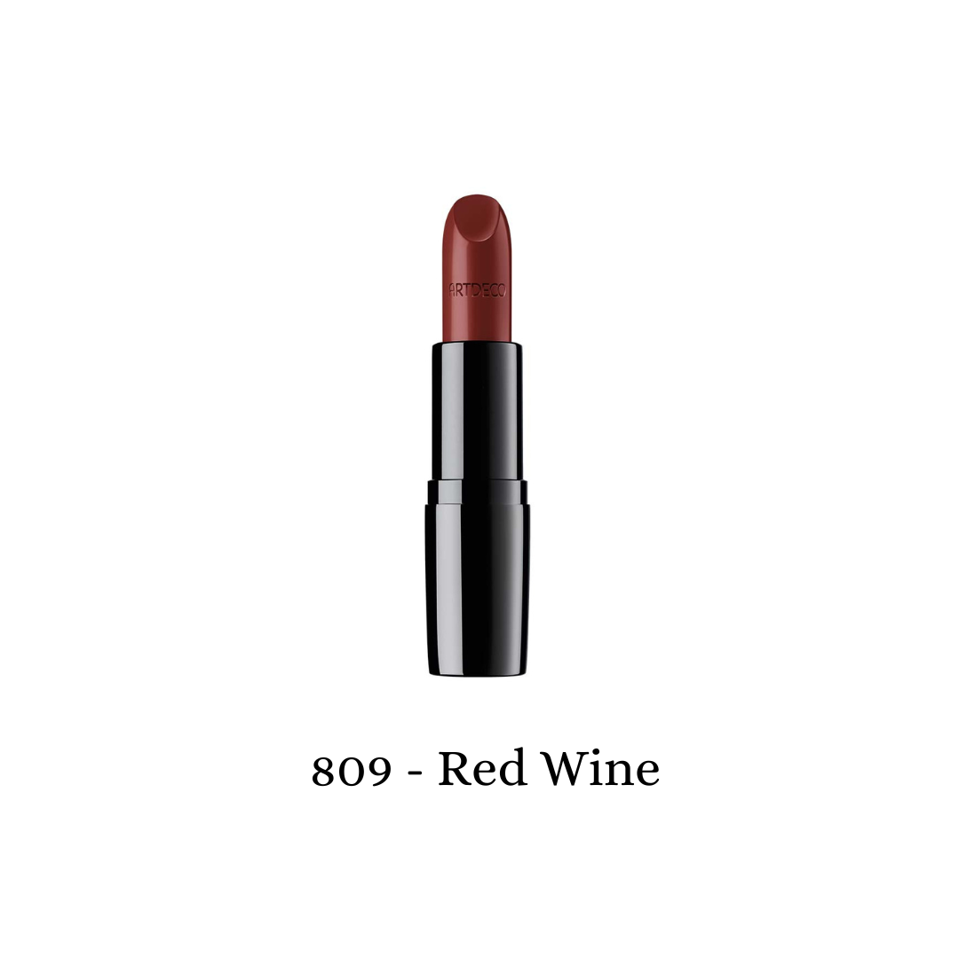 ARTDECO Perfect Color Lipstick in a rich red wine shade, showcasing a smooth, creamy lipstick bullet with a sleek packaging design.