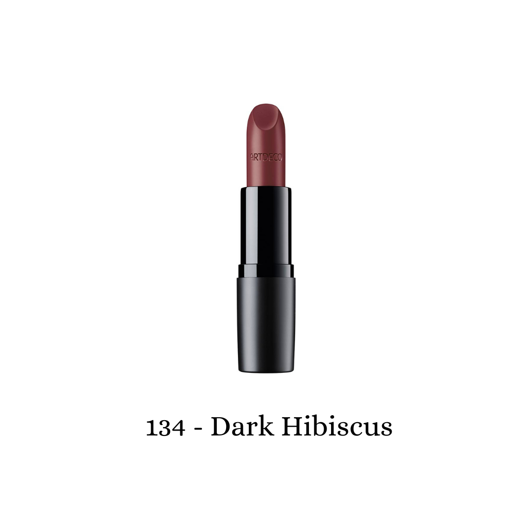 Dark hibiscus shade of ARTDECO Perfect Mat Lipstick showing a smooth, matte lipstick bullet in a close-up shot.