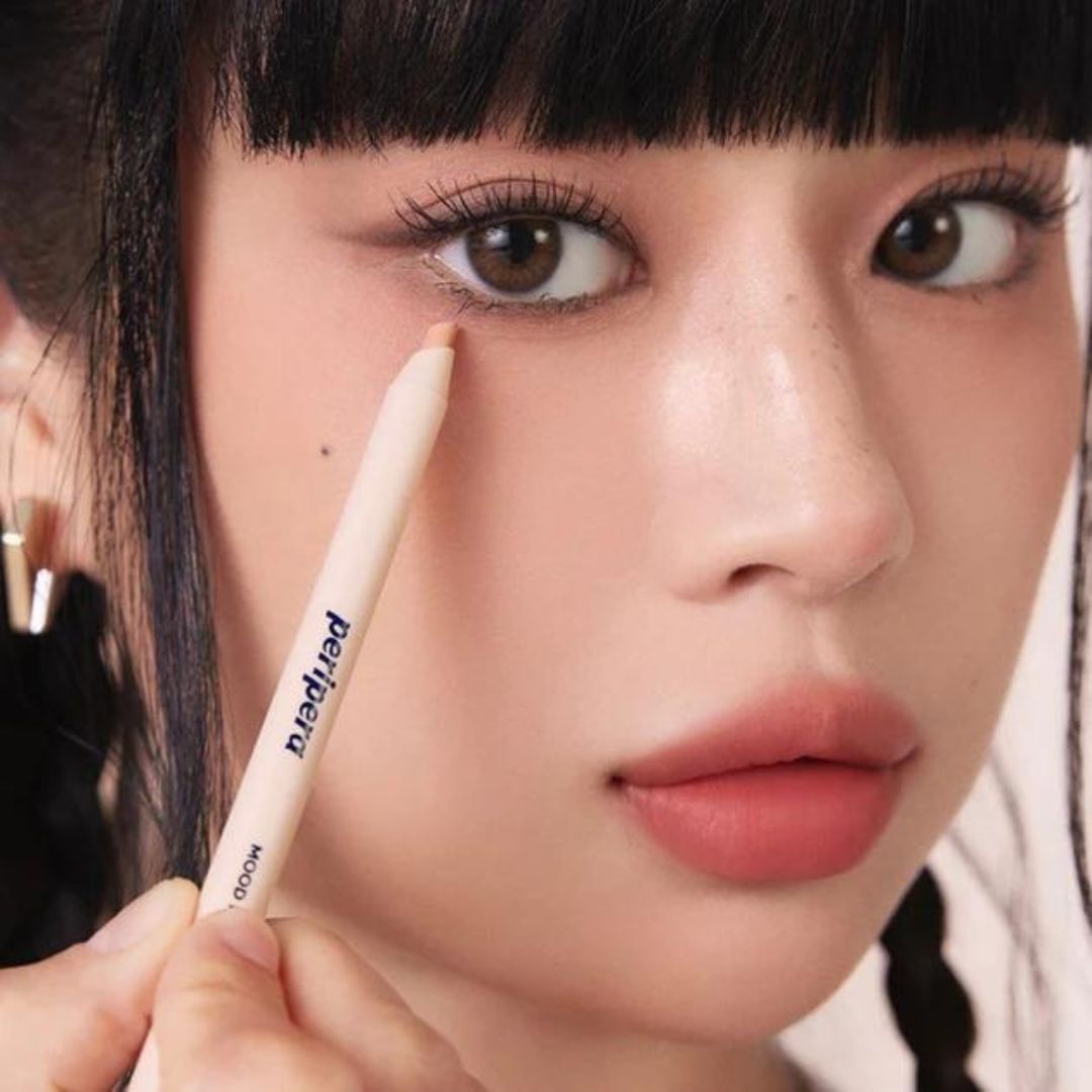 Peripera Mood Fit Pencil Concealer and Corrector in a sleek pencil form, ready for precise application on skin.