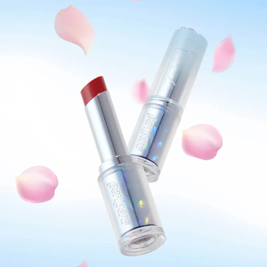 Peripera Ink Mood Glowy Balm lipstick in Cardcaptor Cherry, featuring a vibrant pink shade and glossy finish.