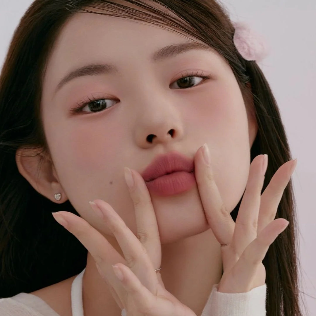 Peripera Slip On My Lip lipstick in a sleek tube, showcasing vibrant lipstick color ready for application.