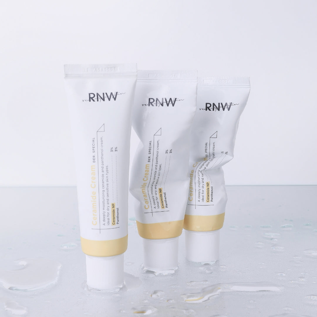 RNW Der. Special Ceramide Cream 50ml face moisturizer in a white jar with a blue lid, featuring smooth cream inside.