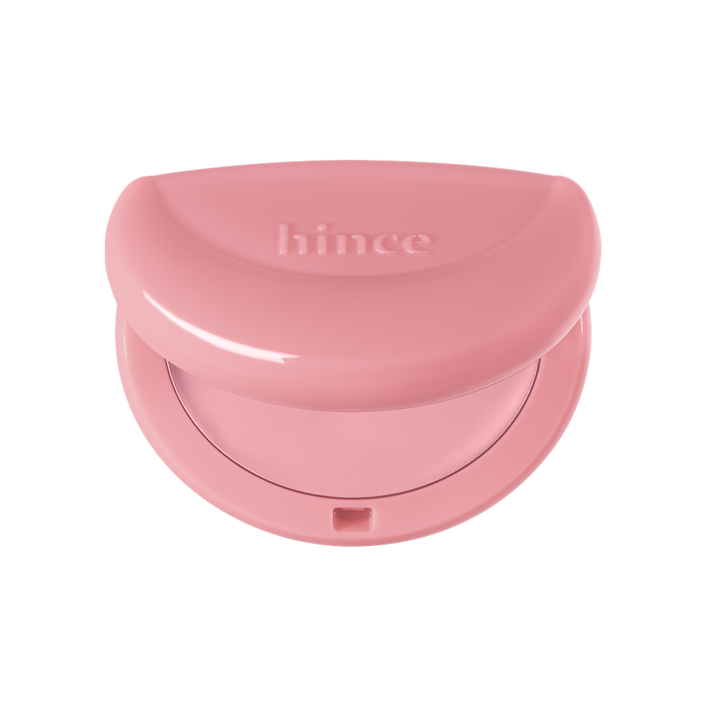 Hince Half-Moon Cheek Cream to Powder Blush in soft pink shade, showing smooth, blended blush on model's cheek.