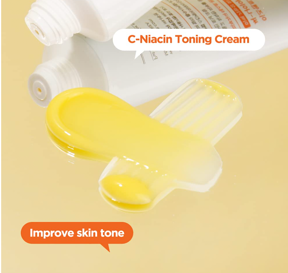 Isntree C-Niacin Toning Cream 50ml face moisturizer jar with white lid and label, highlighting skincare for brightening and hydration.
