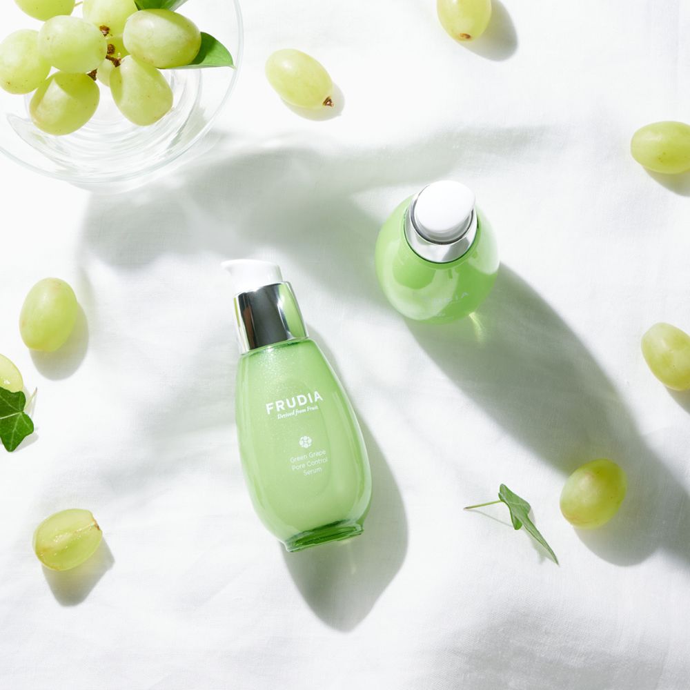 Frudia Green Grape Pore Control Serum 50g in a transparent dropper bottle, showing the serum inside.