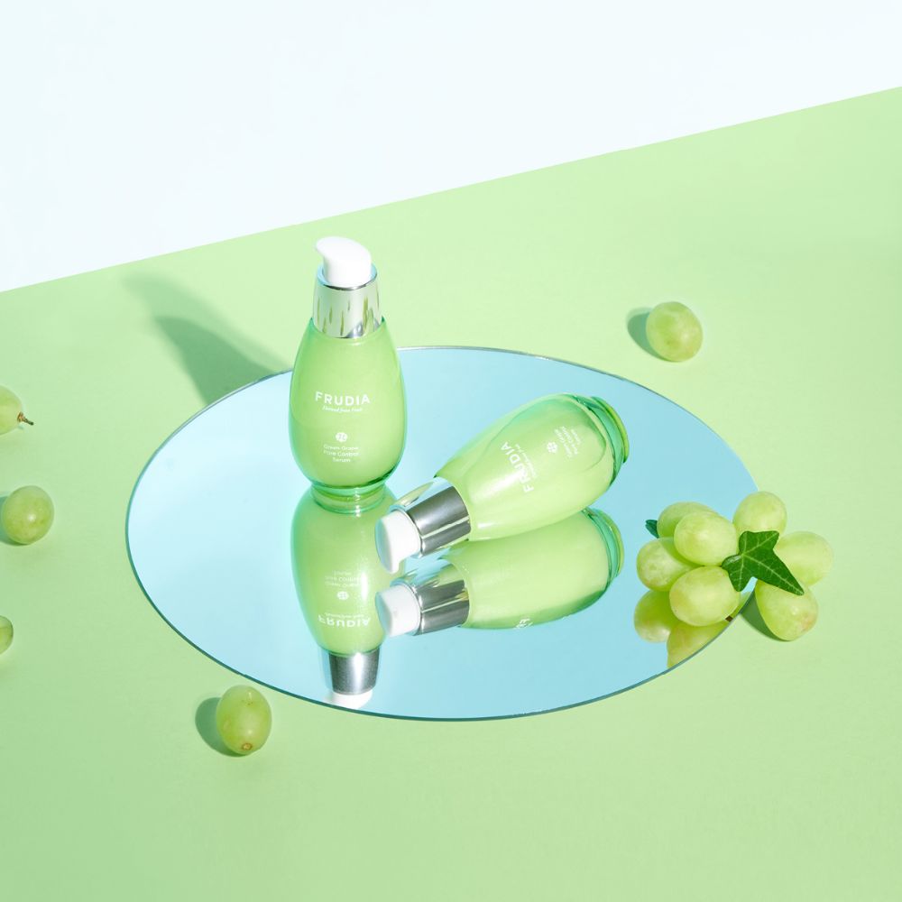 Frudia Green Grape Pore Control Serum 50g with a sleek bottle and dropper for clear, smooth skin.