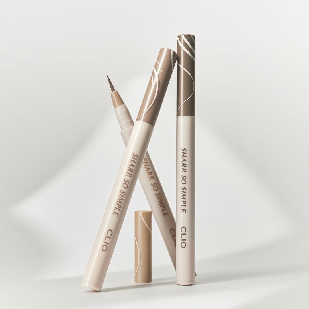 Clio Sharp So Simple Shade Brush Liquid Eyeliner with precise applicator and sleek black cap, showcasing the product's packaging.