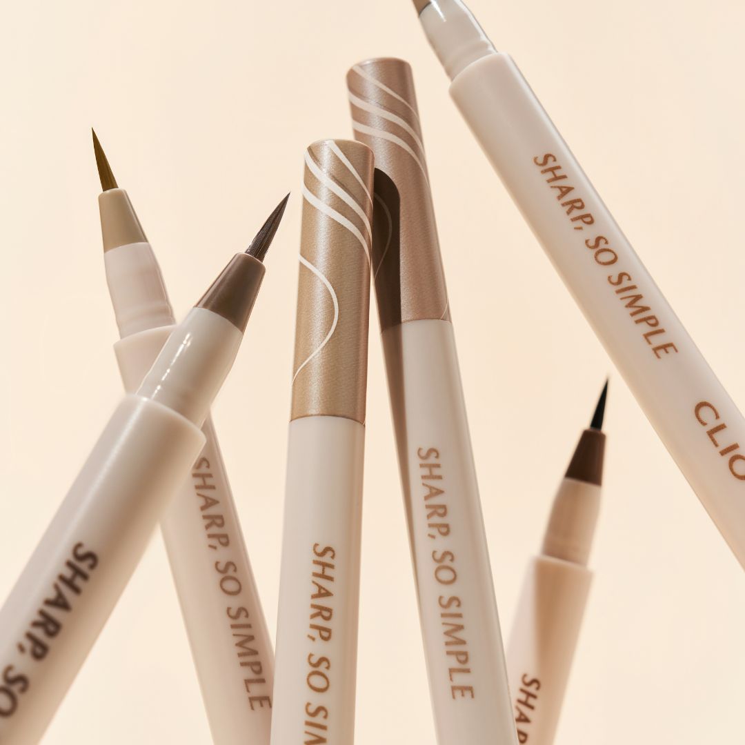 Clio Sharp So Simple Shade Brush Liquid Eyeliner with precise black tip and sleek packaging, ideal for defining eyes.