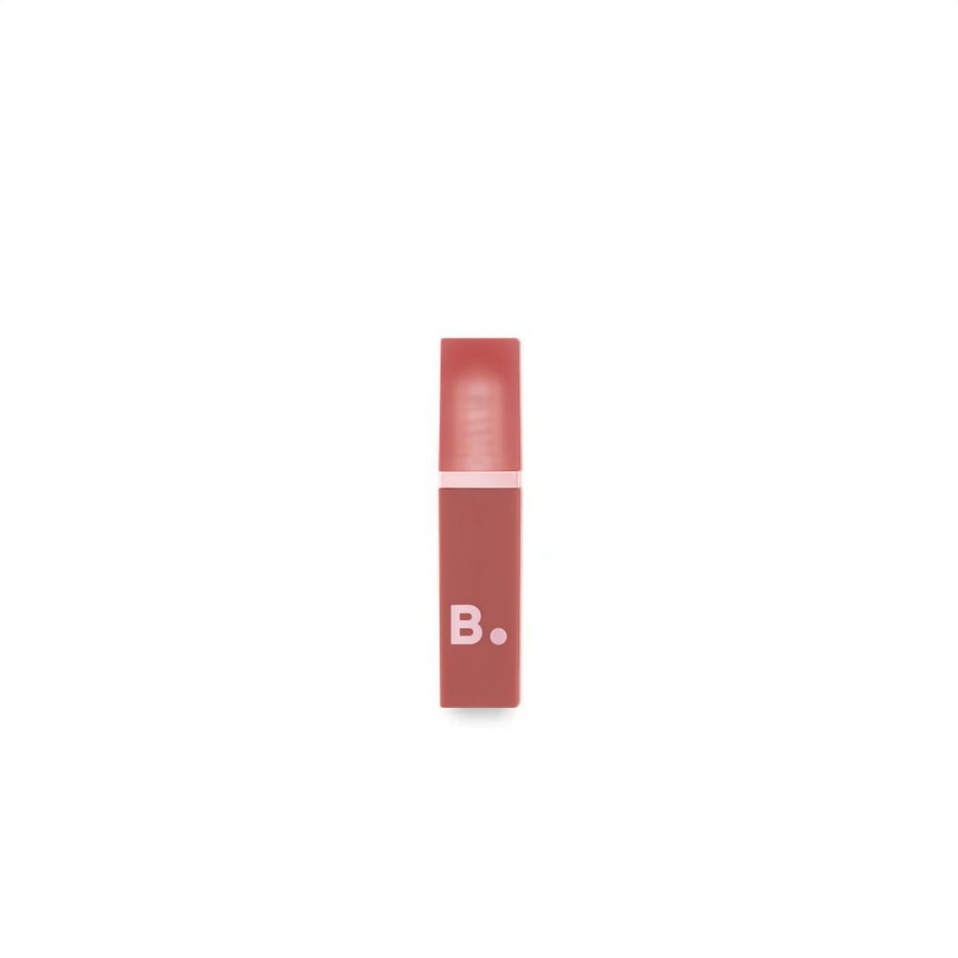 Banila Co B. By Banila Sheer Velvet Veil Tint lip tint in CR01, showing a soft, sheer pink lip color on smooth lips.