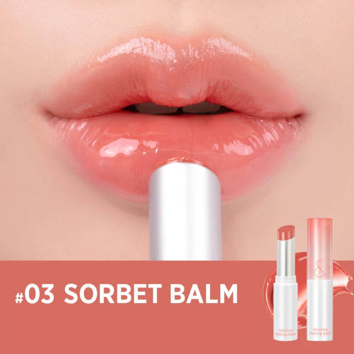 Rom&nd Glasting Melting Balm lipstick in sorbet shade, creamy lip balm with a smooth, glossy finish, visible on lips.