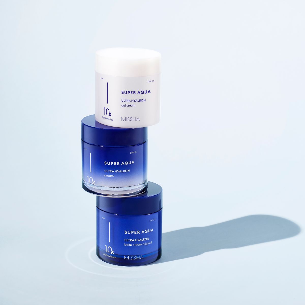 Missha Super Aqua Ultra Hyalron Gel Cream 70ml face moisturizer in a clear jar with a blue lid, showcasing its hydrating formula.