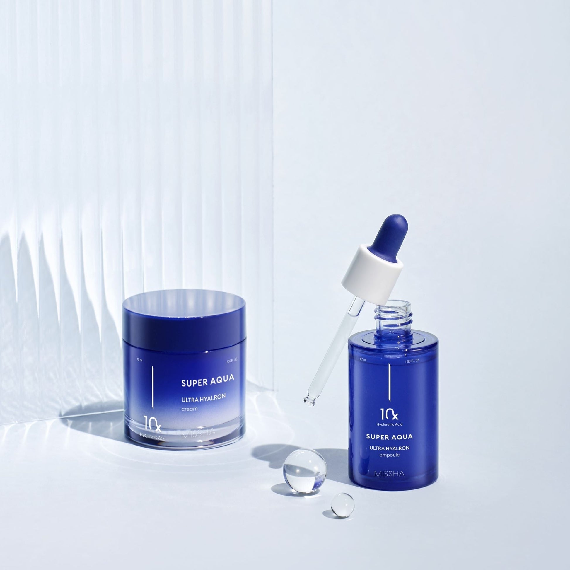 Missha Super Aqua Ultra Hyalron Ampoule 47ml, clear glass bottle with dropper, designed for hydrating skincare.