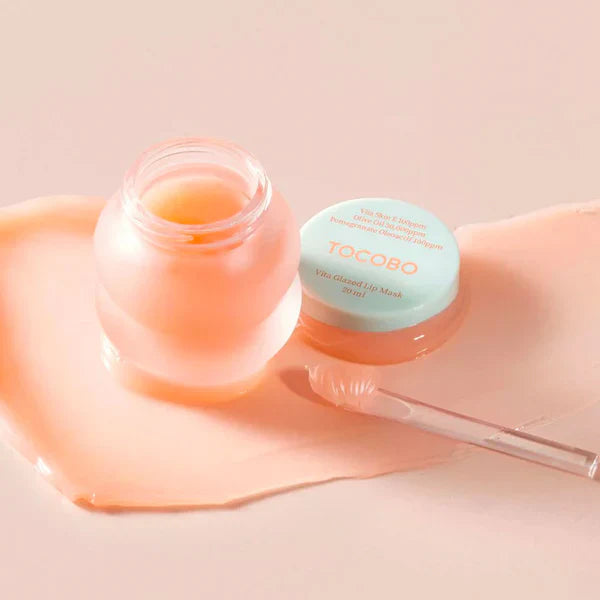 TOCOBO Vita Glazed Lip Mask 20ml in a sleek jar, featuring a shiny, nourishing lip treatment with a nude glow finish.