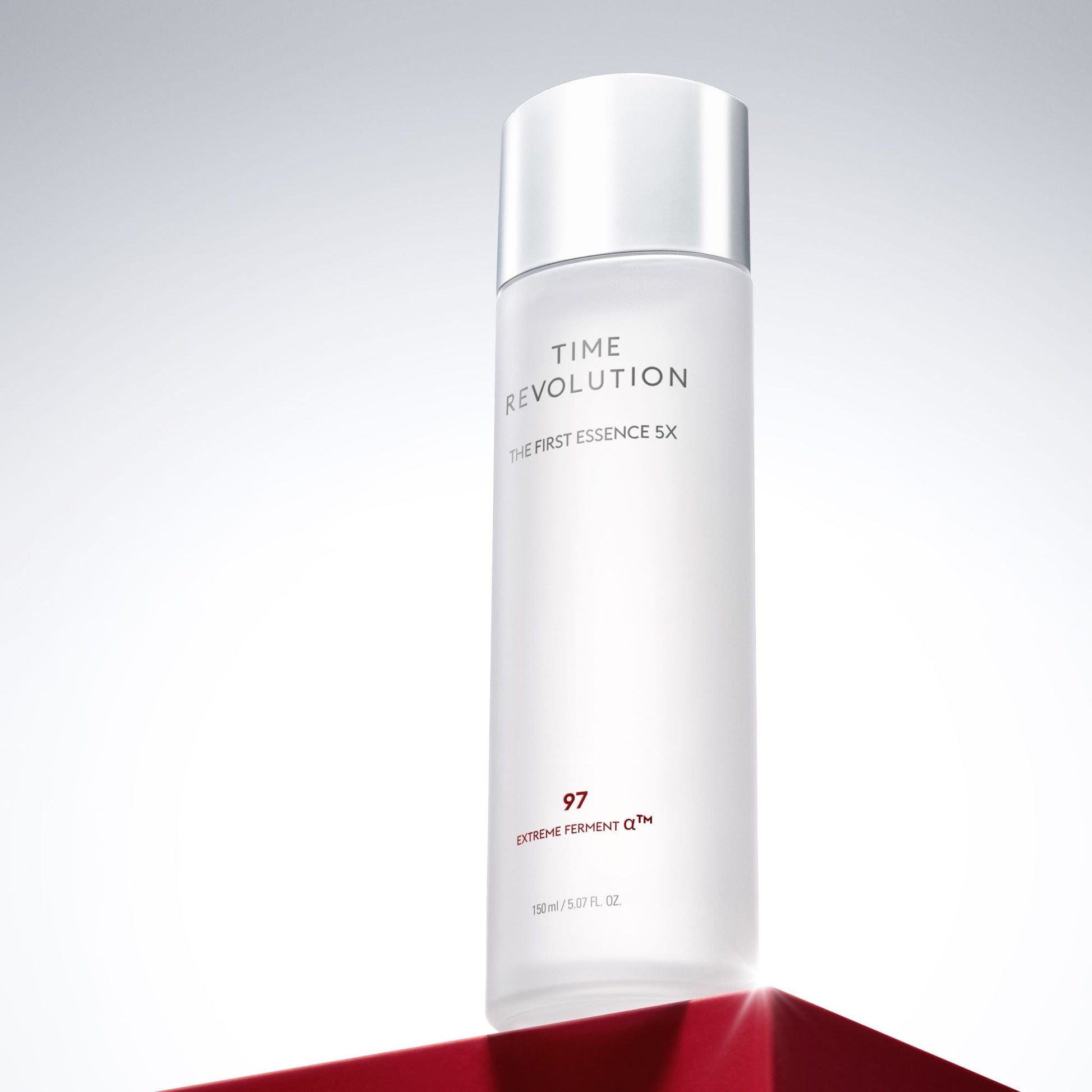 Missha Time Revolution The First Essence 5X in a clear 150ml bottle, with a white cap and minimalist labeling.
