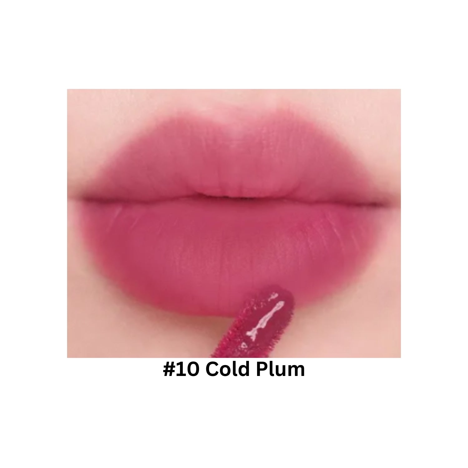 Too Cool For School Dew Blurry Tint lip tint in Cold Plum shade showing a close-up of the tinted lips with a soft, blurred finish.