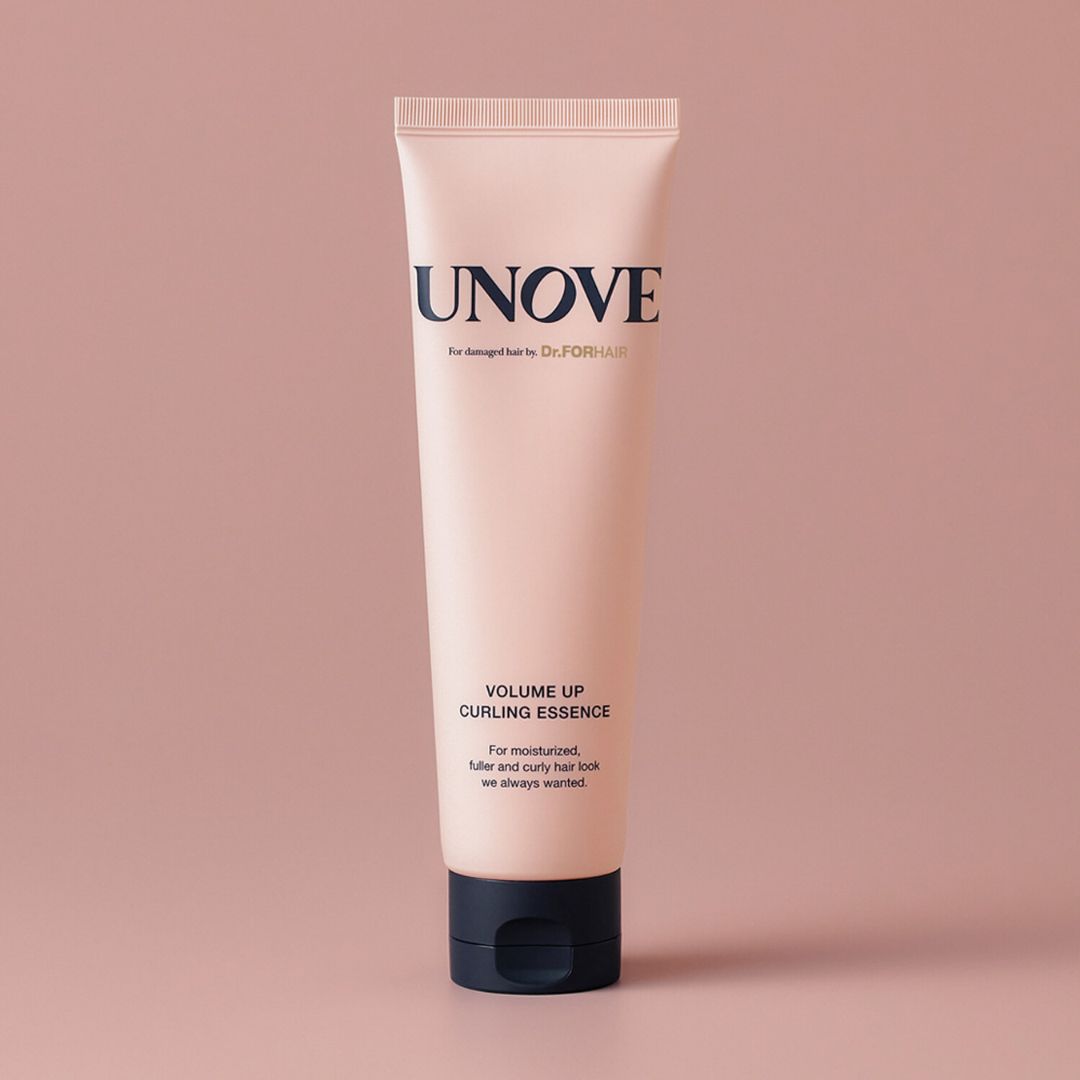 UNOVE Volume Up Curling Essence in 147ml bottle, a conditioner and treatment for enhanced, bouncy curls and defined hair.