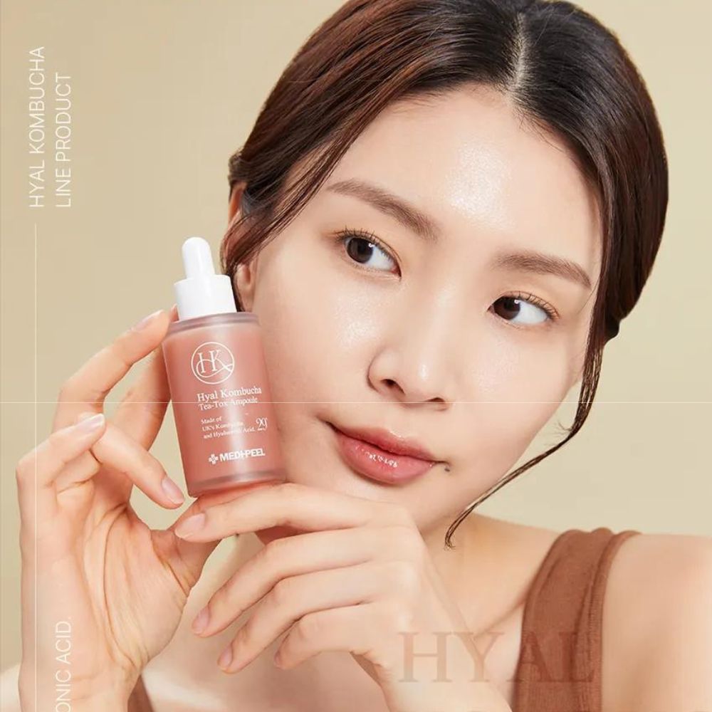 Hyal Kombucha Tea-Tox Ampoule by MEDIPEEL+ in a 50mL clear glass ampoule with a white label and silver cap.