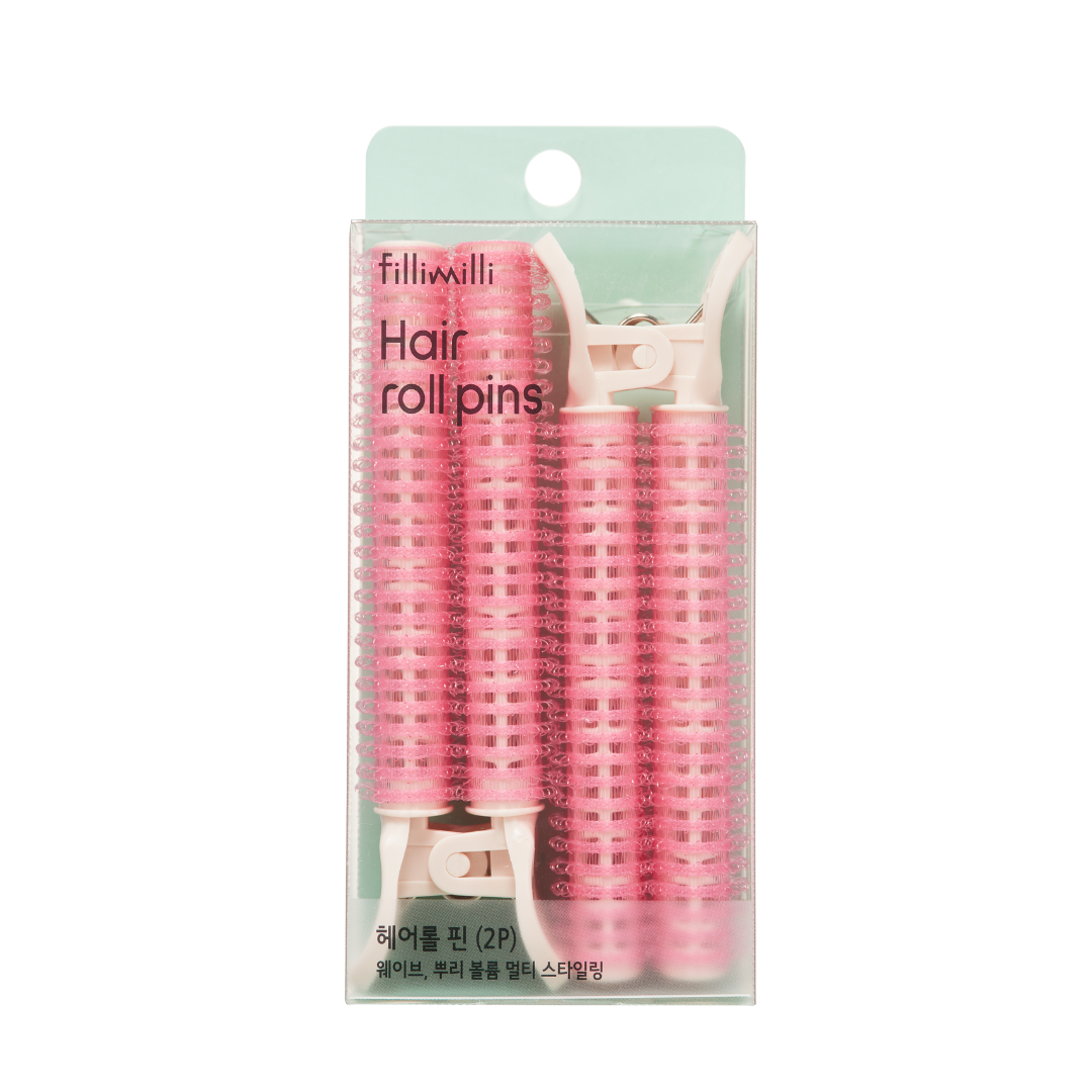 Fillimilli Big Hair Roll Pin for styling, shown in a close-up image with the pin positioned for creating voluminous hair styles.
