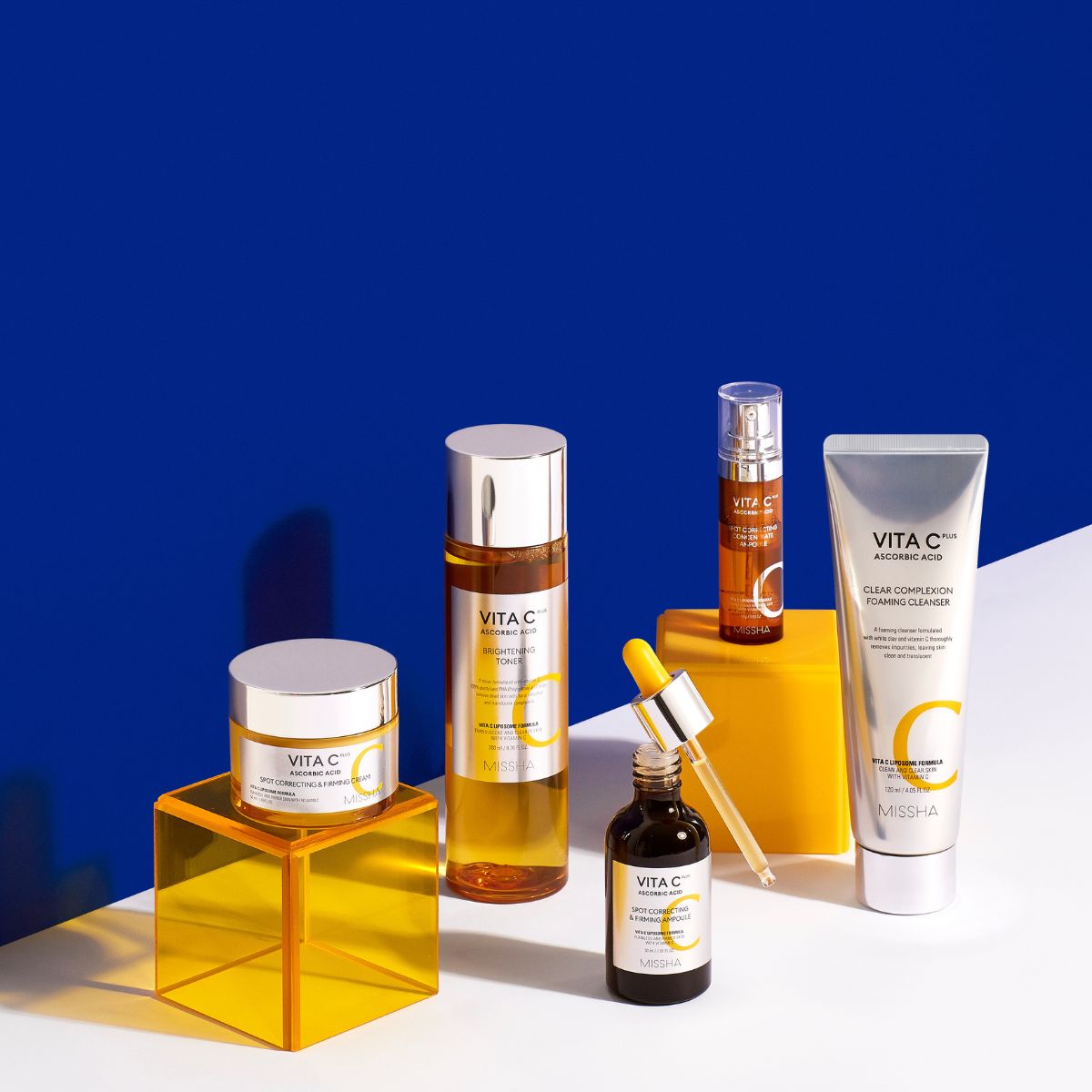 Missha Vita C Plus Clear Complexion foaming cleanser gel in a 120ml bottle, featuring a white and orange packaging design.