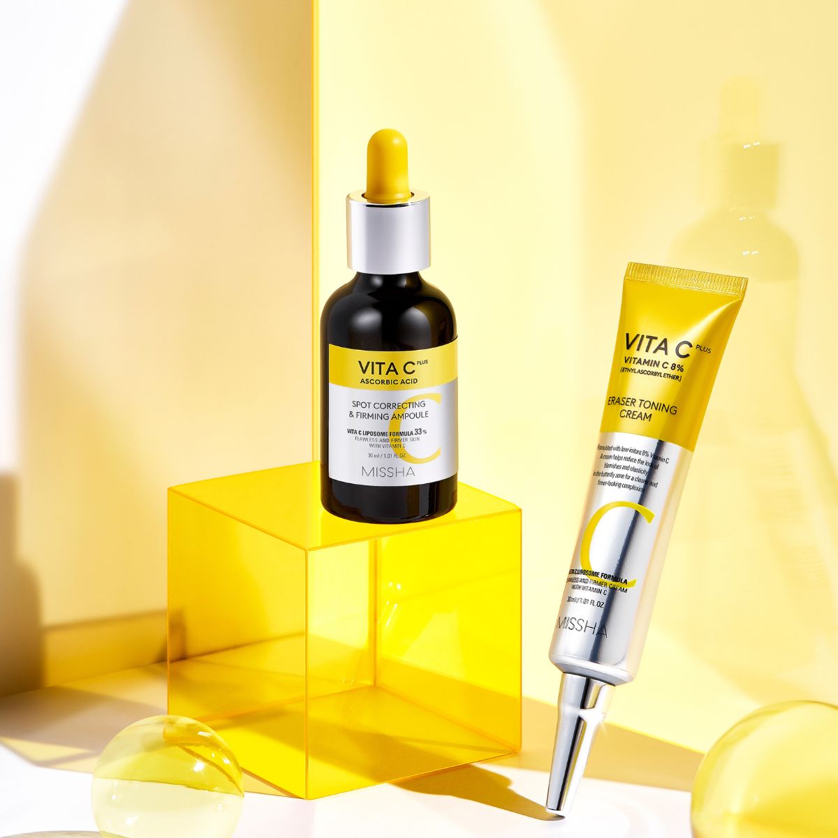 Missha Vita C Plus Eraser Toning Cream 30ml in a sleek jar, showing the face moisturizer with bright orange packaging and label.