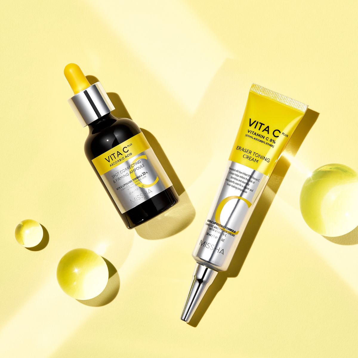 Missha Vita C Plus skincare set with vitamin C ampoule and toning cream, featuring four skincare items for brightening and hydration.