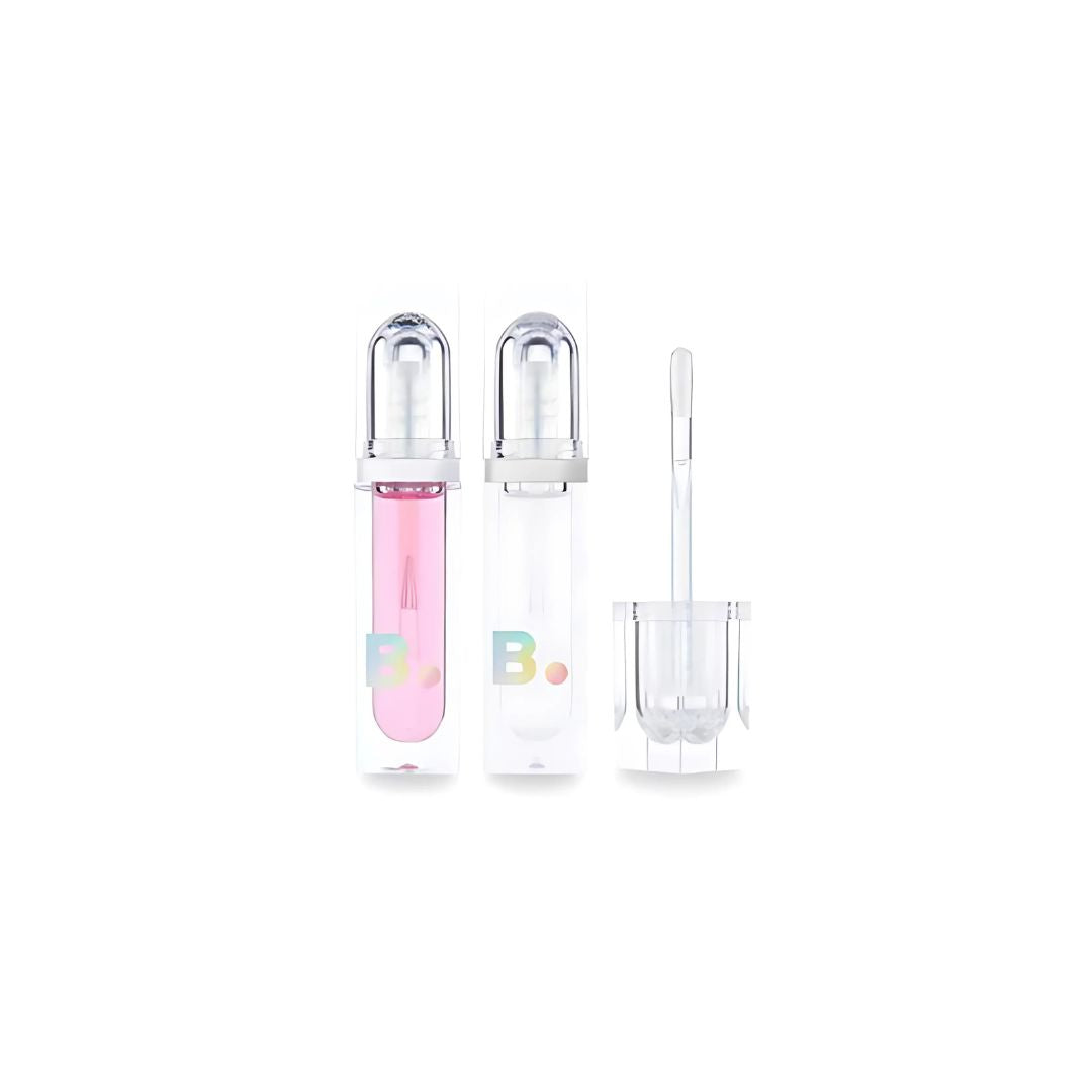 Banila Co volume lip plumper showing two different shades on lips with glossy finish.