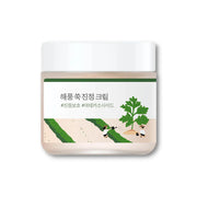 Round Lab Mugwort Calming Cream 80ml face moisturizer in a jar, featuring a soothing herbal formula for sensitive skin.