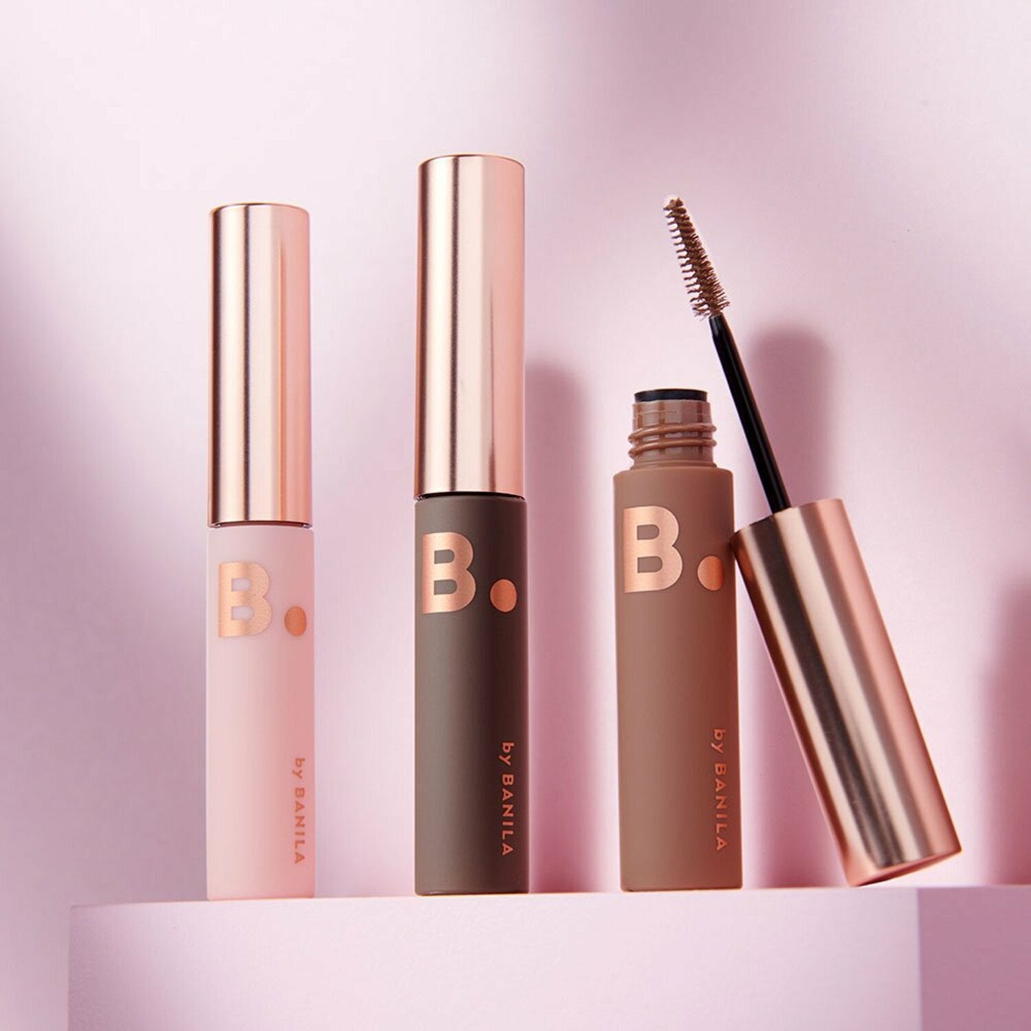 Banila Co B. By Banila Smudge Out Detail Browcara applying tinted brow gel to eyebrows