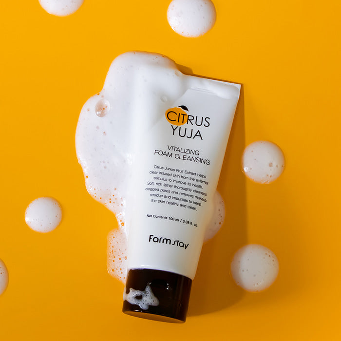 Farmstay Citrus Yuja Vitalizing Foam Cleanser in 100ml gel and foam cleanser bottle with citrus fruit images