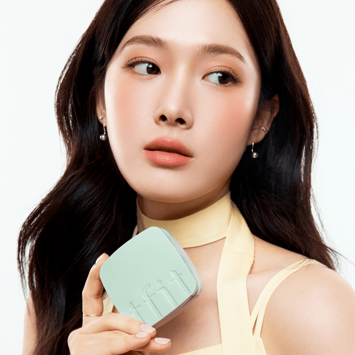 TFIT Base Fit Tone Up Sun Cushion, cushion foundation with SPF, showing smooth, natural skin finish in a compact case.