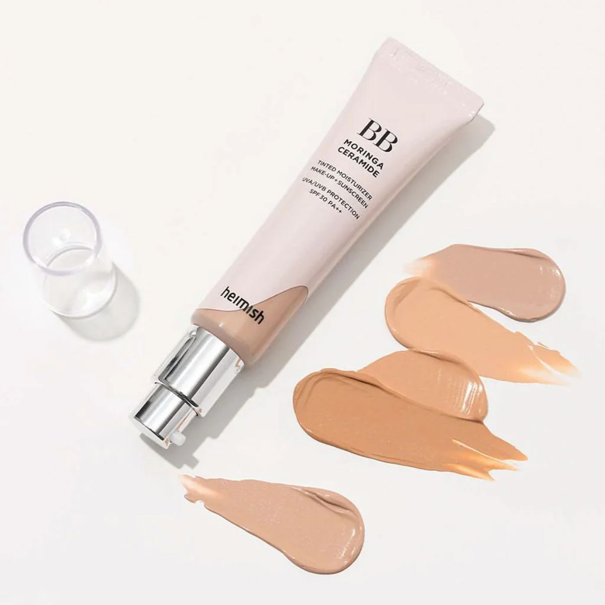Heimish Moringa Ceramide BB Cream 28 Tan, a skincare and makeup product with a smooth beige formula in a tube.