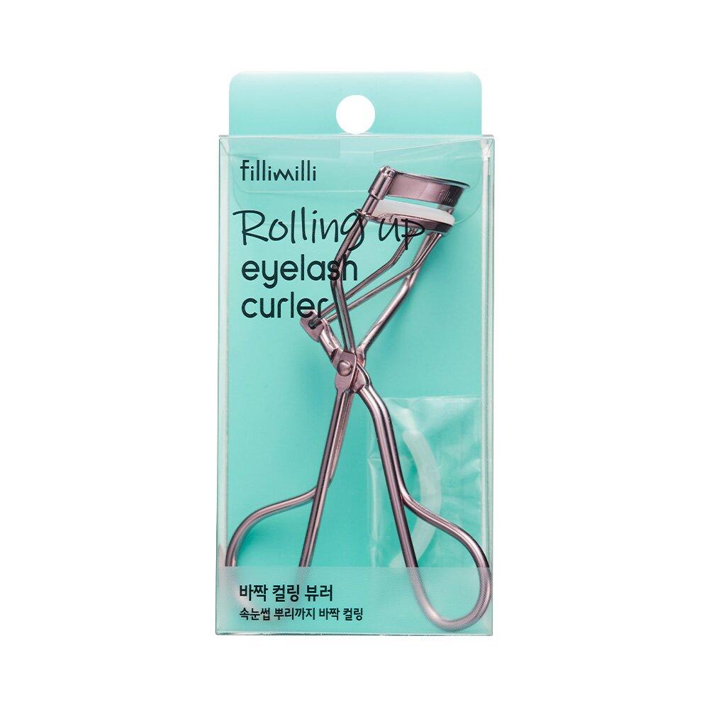 Fillimilli rolling eyelash curler with black rubber padding and curved metal clamp for curling eyelashes.