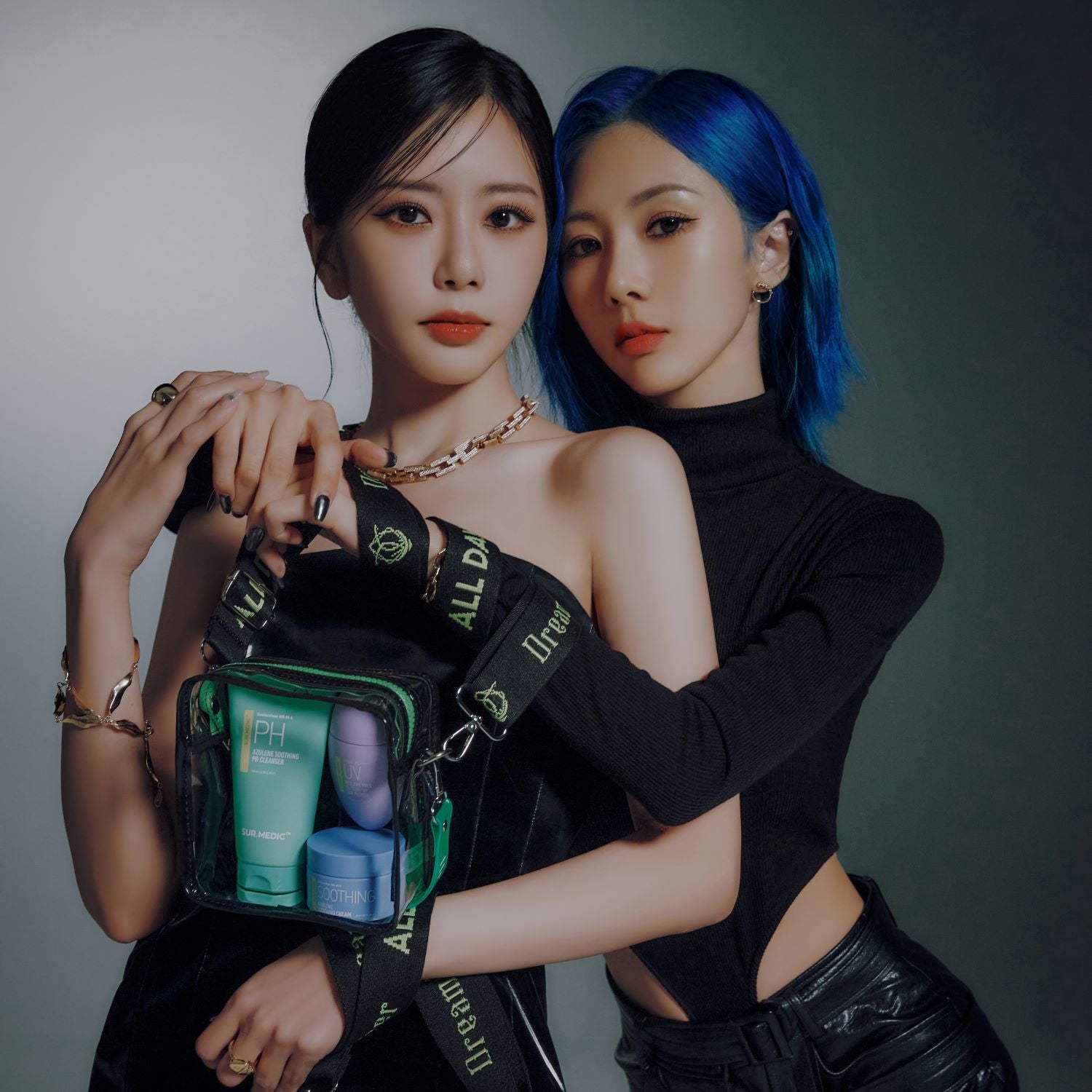 NEOGEN Sur.Medic X Dreamcatcher Ji U Hyeon Azulene Soothing Care skincare set with multiple blue and white bottles and jars.
