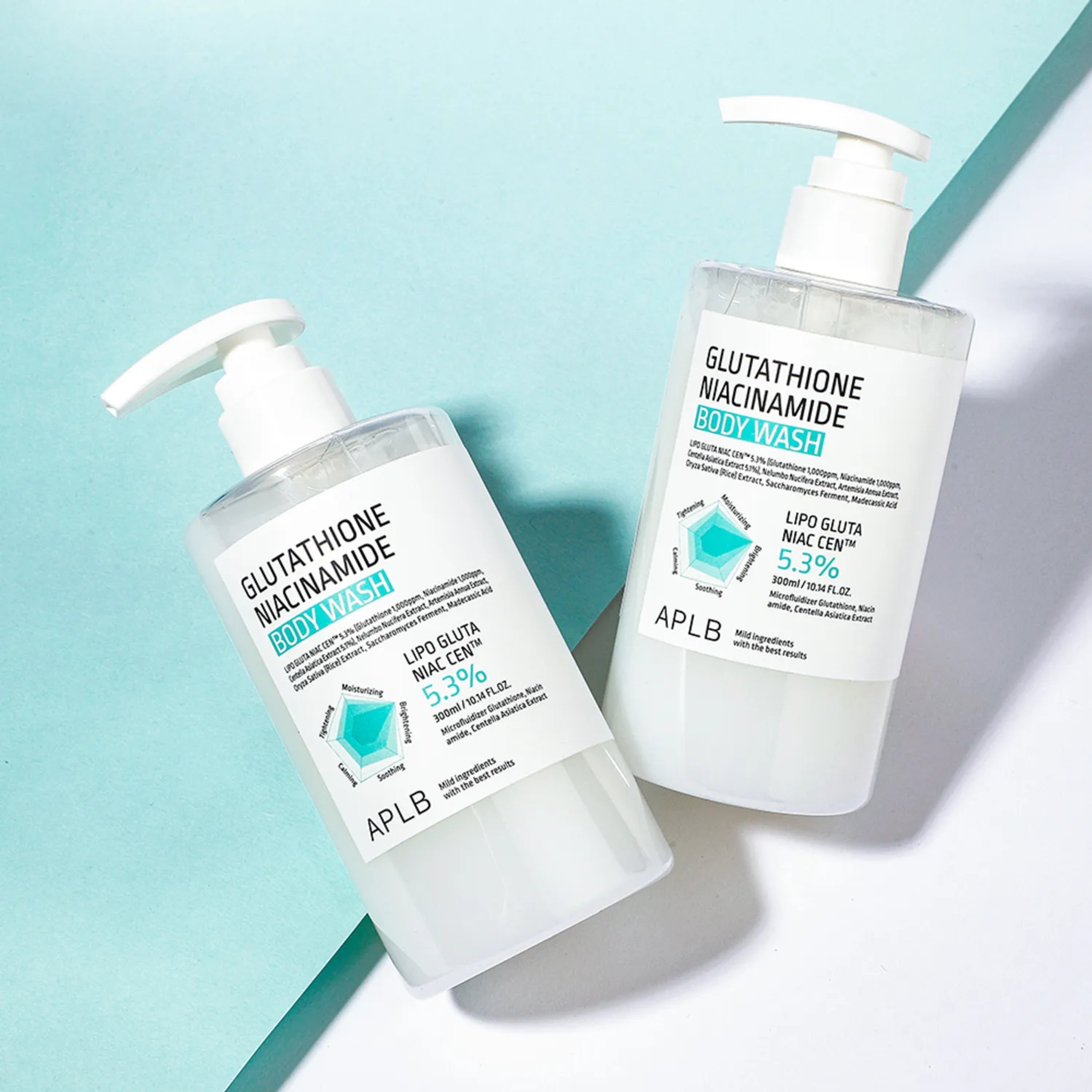 APLB Glutathione Niacinamide Body Wash 300ml with exfoliating scrub, featuring a clear bottle and label showing product details.