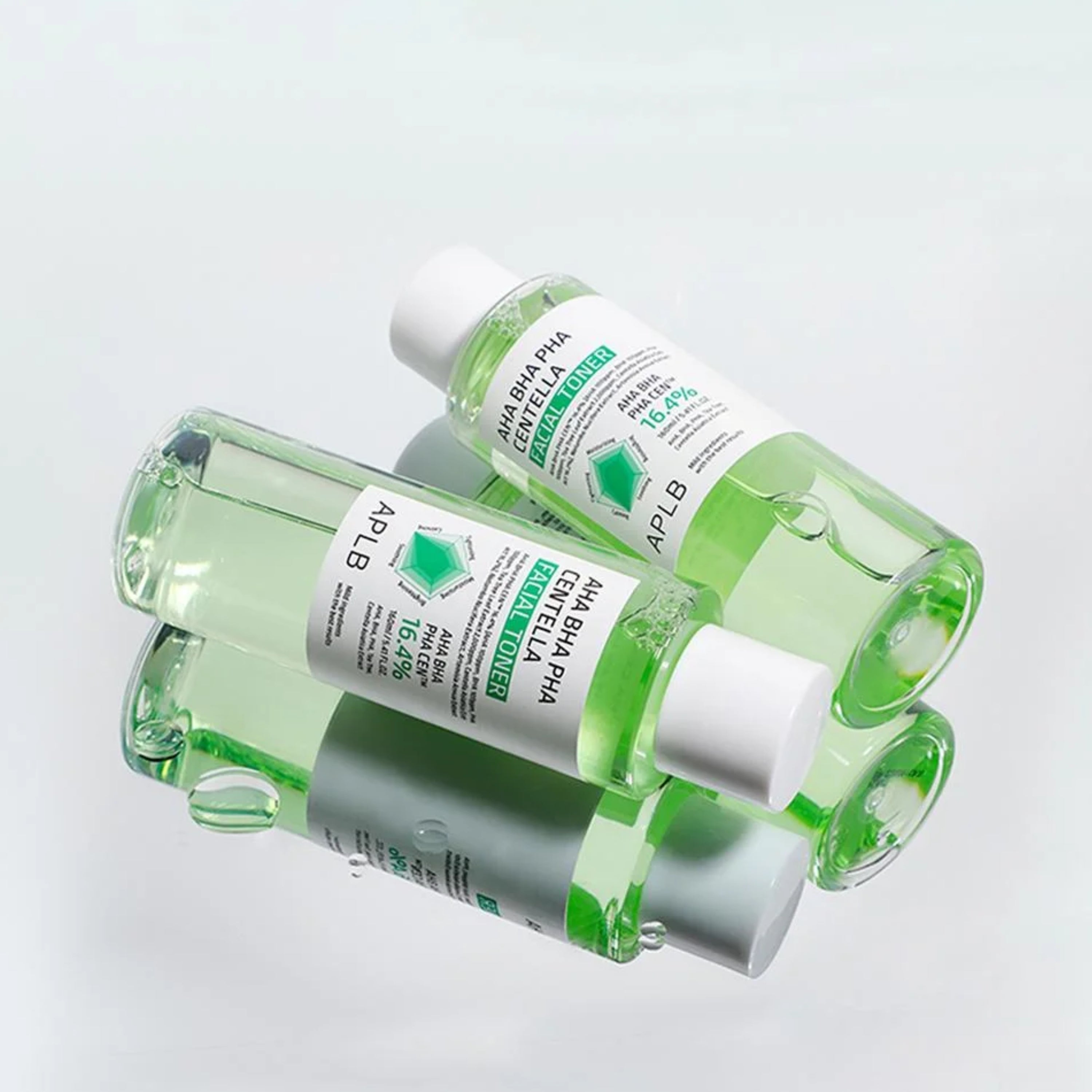 APLB AHA BHA PHA Centella Facial Toner in 160ml bottle, showing clear liquid and label with natural ingredients for skincare.