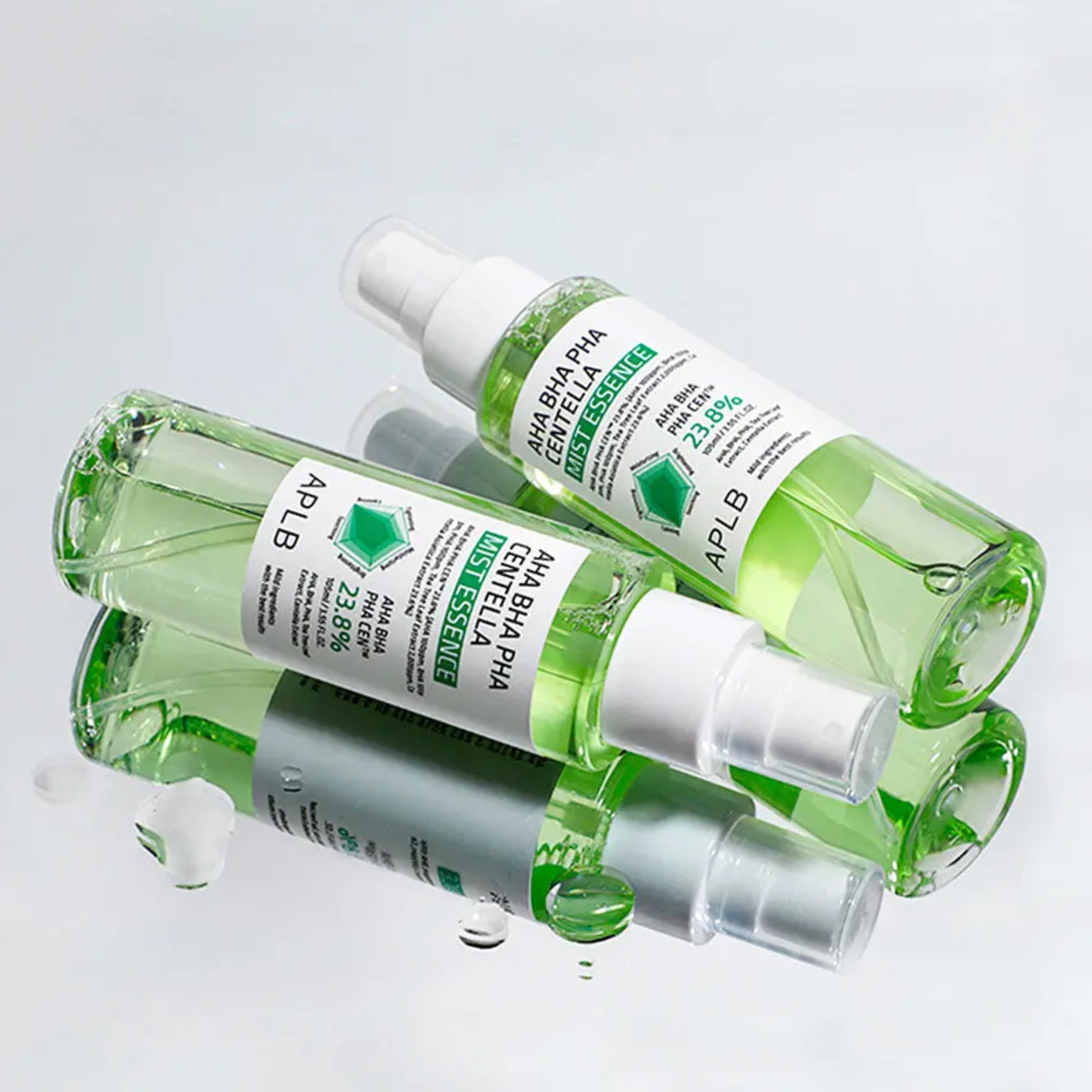 A 105ml bottle of APLB AHA BHA PHA Centella Mist Essence facial mist with a clear spray bottle and label showing product details.
