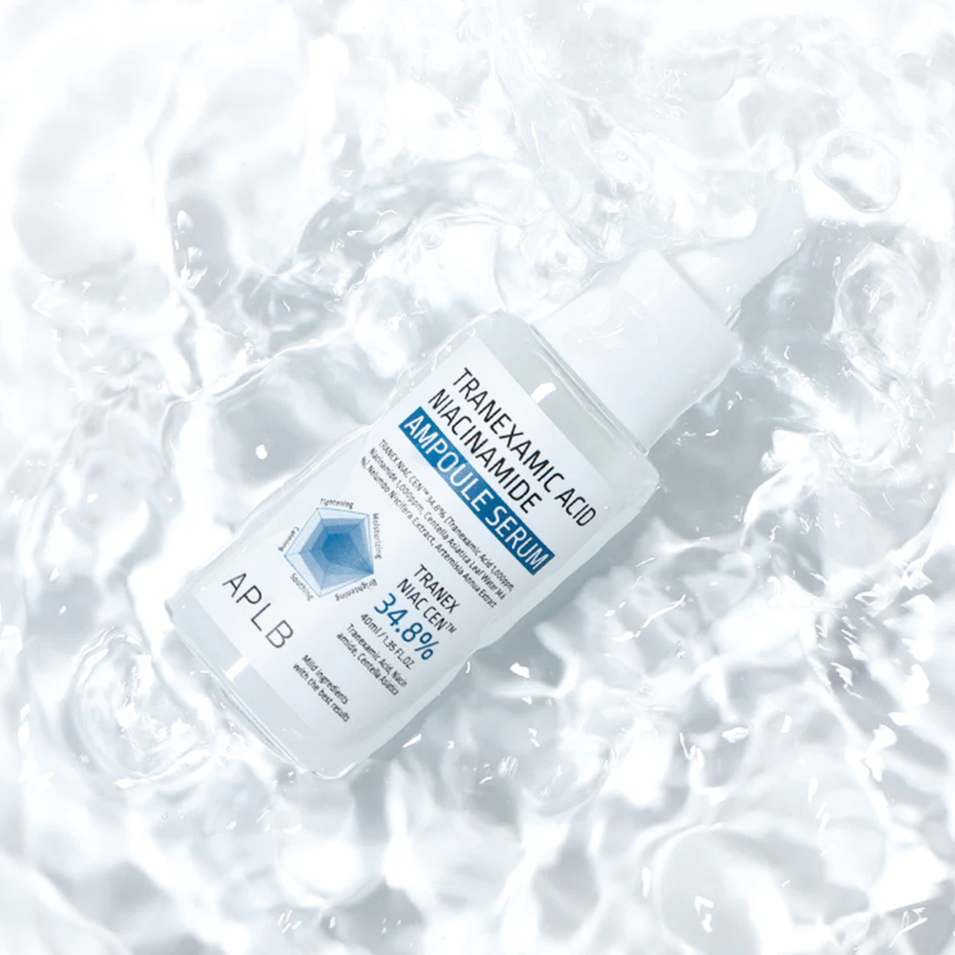 Tranexamic Acid and Niacinamide serum in a 40ml bottle by APLB, shown in a sleek glass ampoule container.