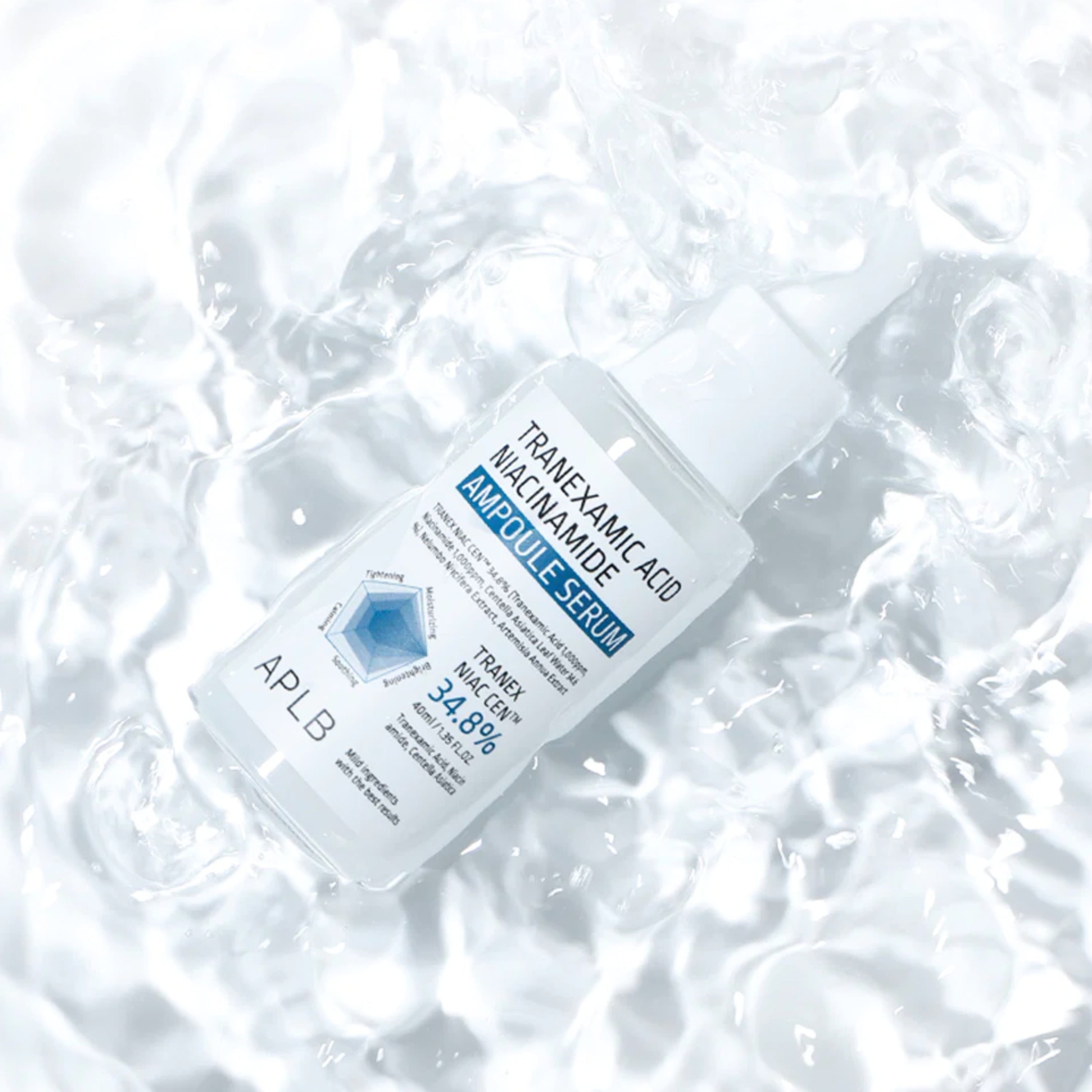Tranexamic Acid and Niacinamide serum in a 40ml bottle by APLB, shown in a sleek glass ampoule container.