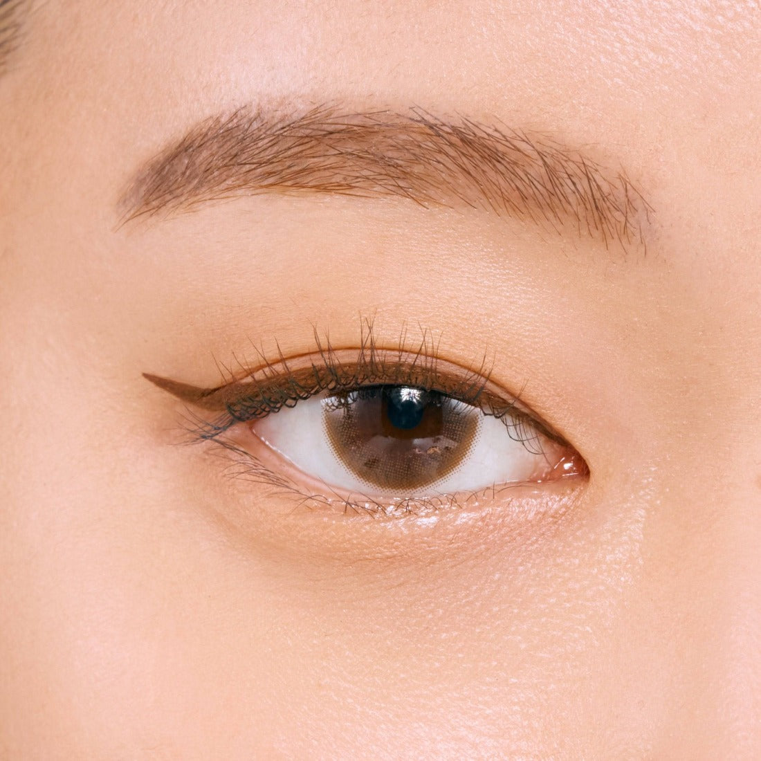 Clio Superproof Pen Liquid Eyeliner in black and brown, featuring precise applicator for bold, waterproof eye makeup.
