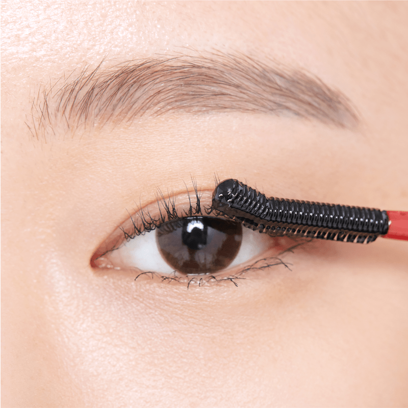 Clio Kill Lash Mascara Remover in a clear bottle, designed for gentle removal of mascara and eye makeup.