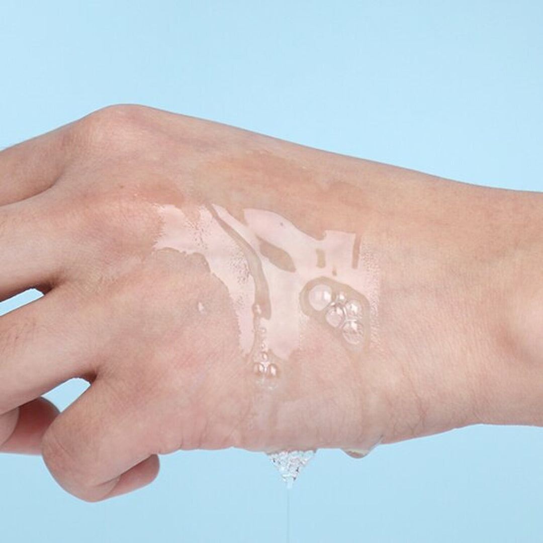 Numbuzin No.6 Deep Sleep Mask Serum 50ml in a clear glass bottle with a pump dispenser, displayed on a neutral background.