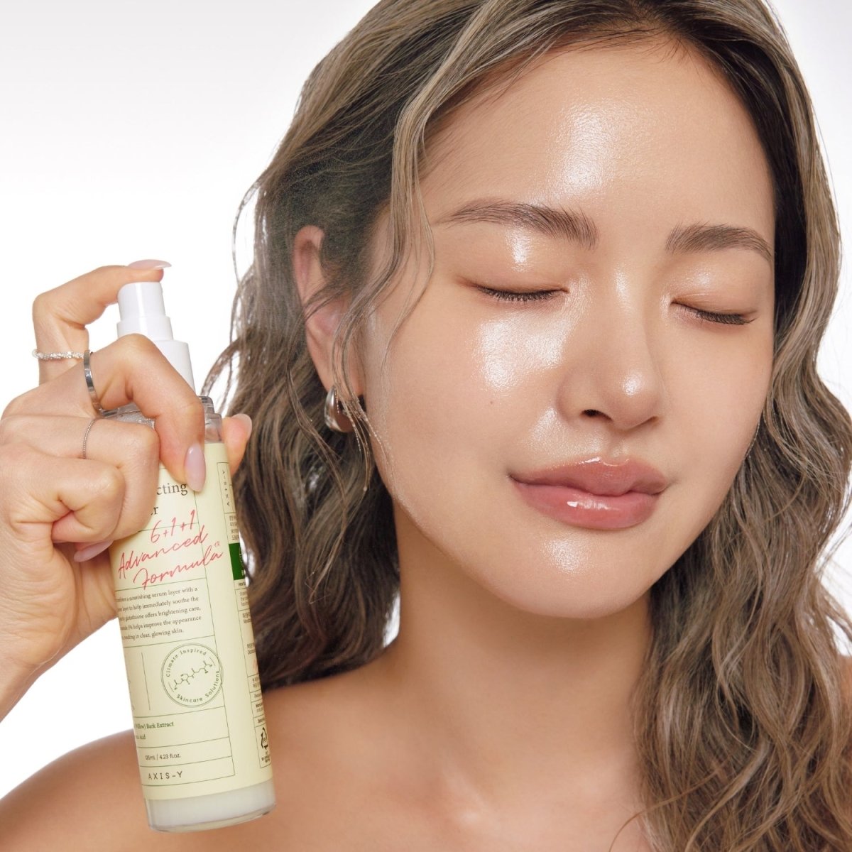AXIS-Y Dark Spot Correcting Glow Toner in 125ml bottle, designed to reduce dark spots and brighten skin.