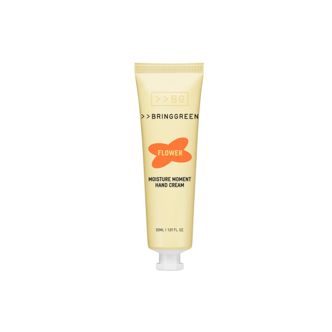 Bring Green Moisture Moment Hand Cream with floral scent in 30ml tube, designed to nourish and hydrate hands.