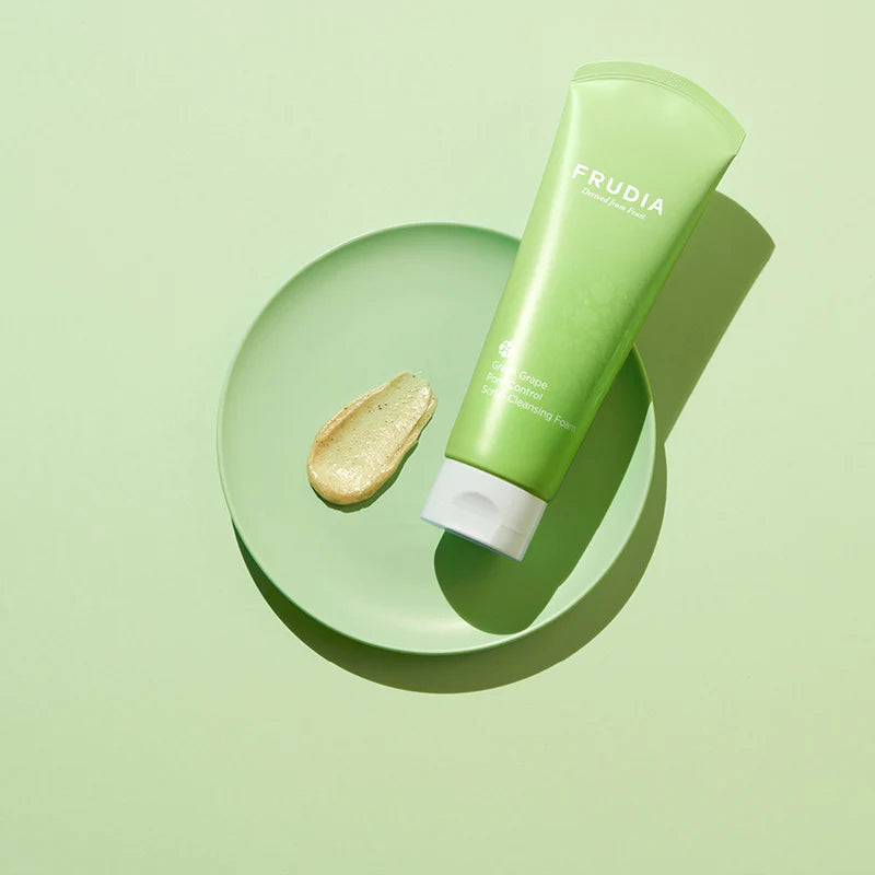 Frudia Green Grape Pore Control Scrub Cleansing Foam in a 145ml tube, gentle gel and foam cleanser for pore care.