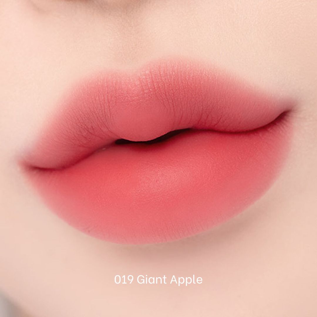 Clio Chiffon Blur Tint lip tint in vibrant fruity shade, shown in a close-up image with smooth, glossy finish on lips.