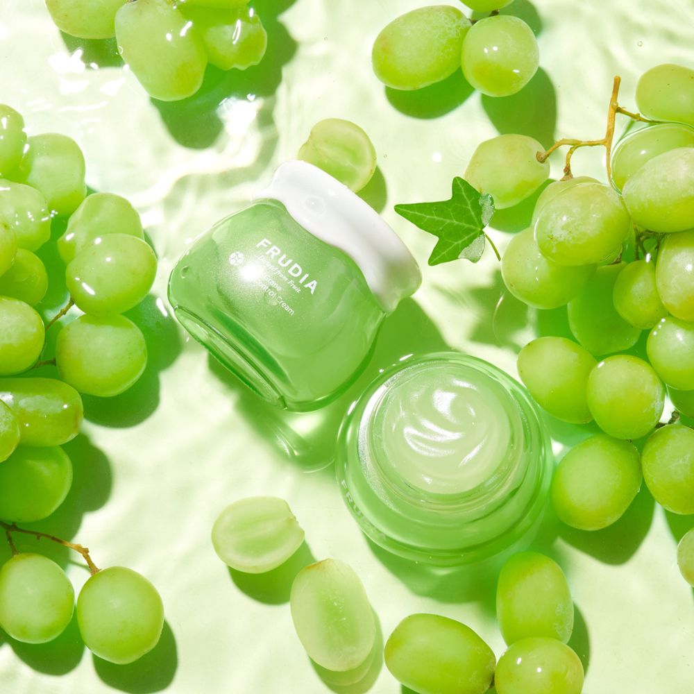 Frudia Green Grape Pore Control Face Moisturizer with green grape extract and smooth texture in a white jar.