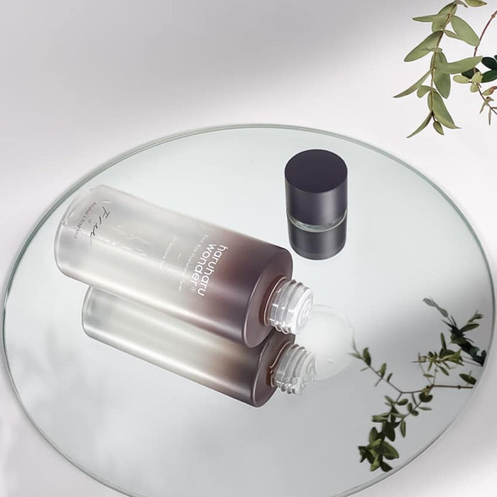 Haruharu Wonder Black Rice Hyaluronic Toner in 300ml bottle, featuring a sleek black and white label, suitable for hydrating skin.