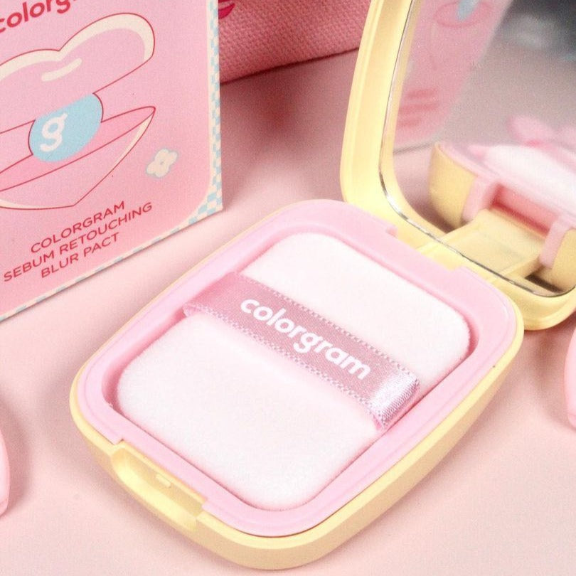 Colorgram Sebum Retouching Blur Pact setting powder in compact with open lid, showing smooth, matte finish on the surface.