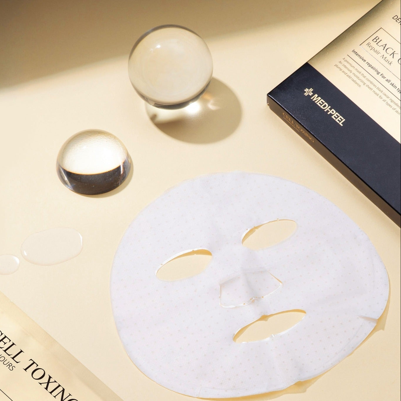 Set of five MEDIPEEL+ Cell Toxing Black Truffle Repair Sheet Masks in black packaging with product branding.